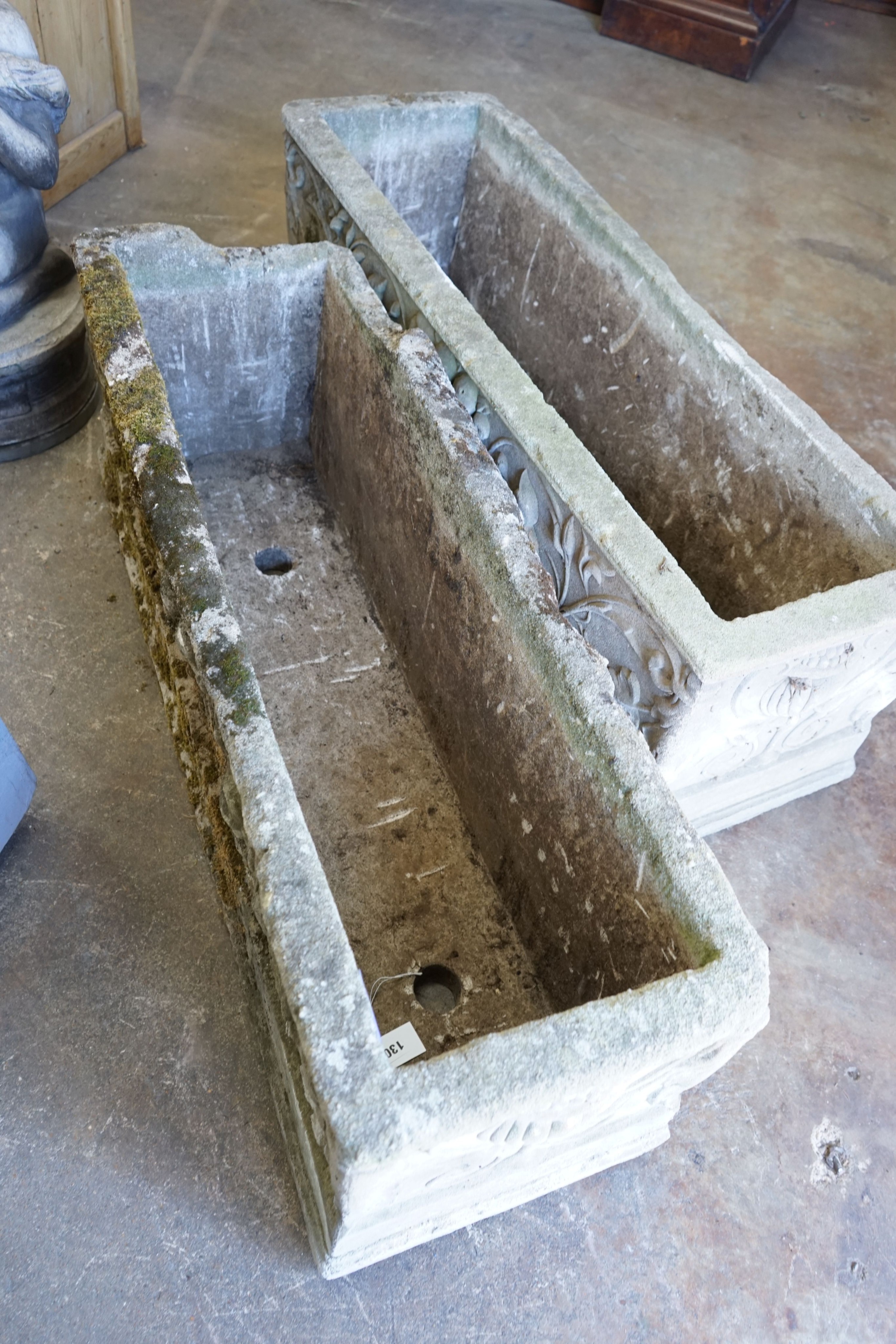 A pair of large rectangular reconstituted stone garden planters, width 117cm, depth 38cm, height 39cm